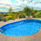 Stålväggspool Ibiza Oval 3,50 × 7,00 × 1,20 m 0,6 mm med Blå Toppskenor P1/P3 och Bottenskenor, med Hål för Skimmer och Inlopp